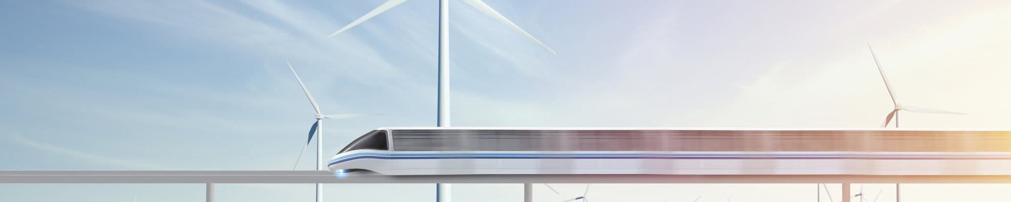 Infrastructures Un train en marche et des éoliennes