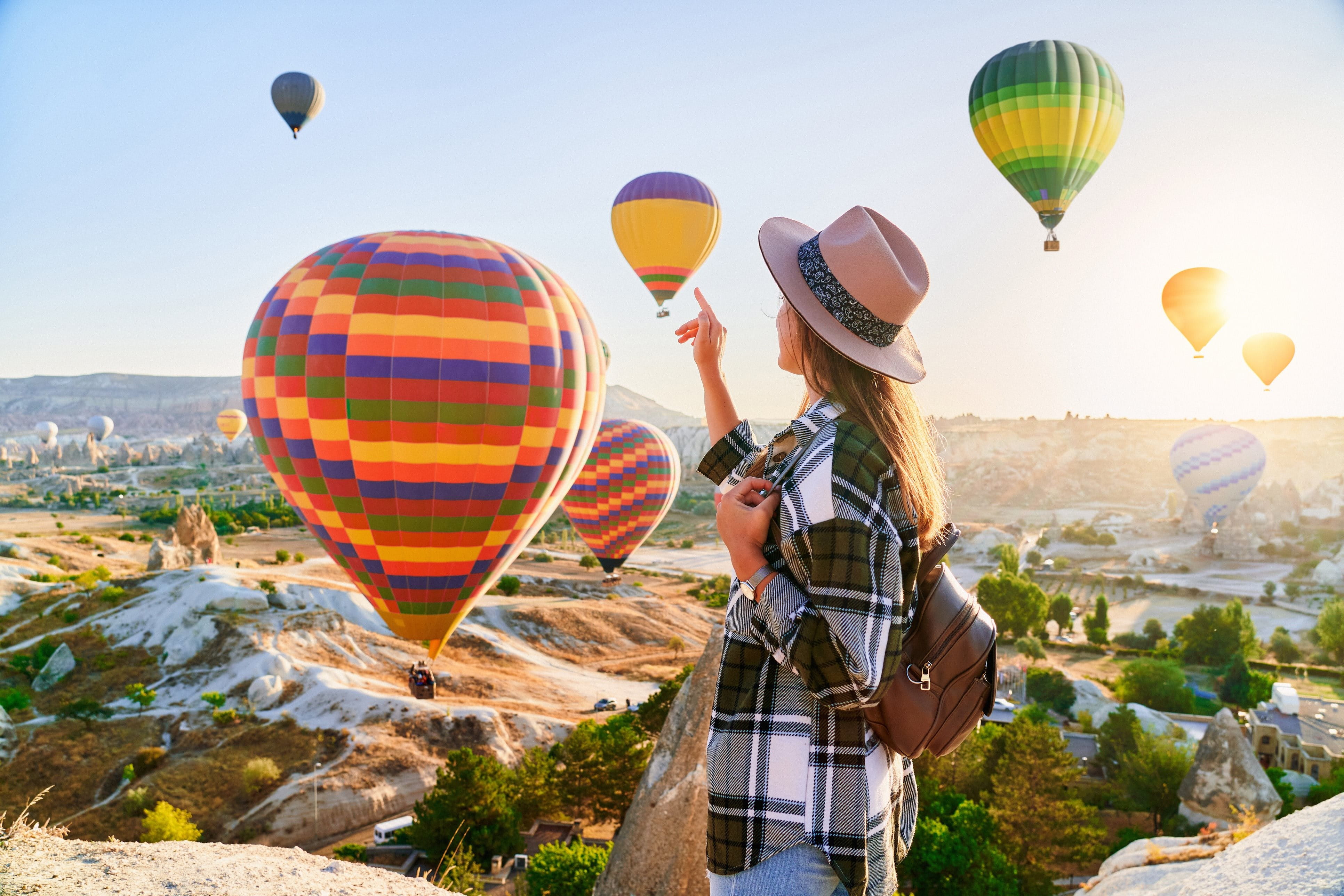 Hot air balloon and young woman